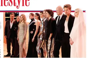  ?? PHOTOS COURTESY OF WARNER BROS. PICTURES ?? n Brilliant director Denis Villeneuve (center) with the cast of ‘Dune: Part Two' at the London premiere on February 15.