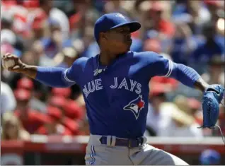  ?? CHRIS CARLSON, THE ASSOCIATED PRESS ?? Toronto Blue Jays starter Marcus Stroman escaped a brief and unusual umpiring decision in the third inning and didn’t allow a baserunner in the next five innings, retiring 17 consecutiv­e Halos in pitching a complete game.