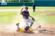  ?? Staff photo by Joshua Boucher ?? n Texas A&M University-Texarkana pitcher Neiko Martinez tags out Texas College’s Baylen Rawlinson on Tuesday at George Dobson Field in Texarkana, Texas.