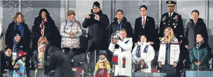  ?? Pictures: Getty. ?? South Korea’s President Moon Jae-in, fourth right, with his wife Kim Jung-sook and US Presidenti­al Adviser Ivanka Trump at the Olympics closing ceremony.