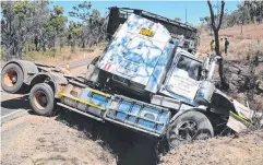  ?? Picture: ANDREA FALVO ?? LUCKY ESCAPE: A driver suffered only minor injuries after his truck rolled near Mt Carbine yesterday.