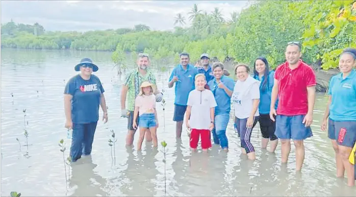  ?? Picture: SUPPLIED ?? Delegates with families from TOPEX 2022, resort staff and Fiji Commerce and Employers Federation staff during mangrove planting.