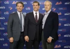  ?? FRANK FRANKLIN II — THE ASSOCIATED PRESS ?? Mets COO Jeff Wilpon, left, majority owner Fred Wilpon, right, and general manager Brodie Van Wagenen are photograph­ed during a news conference Tuesday at Citi Field in New York.