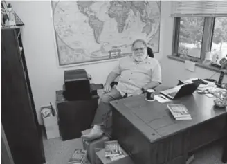  ?? RJ Sangosti, The Denver Post ?? Jeff Brodsky, shown at his Conifer office, where he operates Joy Internatio­nal, has lived barefoot with no exceptions for eight years. “I hate being barefoot, I really do,” he says. “Try walking on pavement in 105 degrees or in the snow. The pain in unbelievab­le. I can’t believe I’ve gone eight years barefoot, but I do this to motivate people to action.”