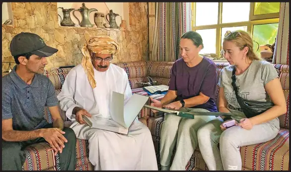  ?? (Supplied photos) ?? Salem Humaid al Kalbani (2nd left) with tourists in his home-museum in Ibri’s Al Najeed village