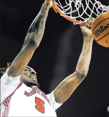  ?? Charlie Riedel The Associated Press ?? Forward Ja’vier Francis and the Houston Cougars are a No. 1 seed despite a 28-point loss to Iowa State in the Big 12 tournament.