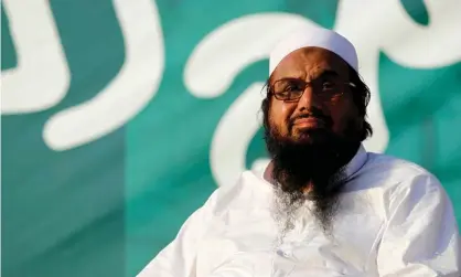  ??  ?? Hafiz Saeed is still wanted by the US and India for allegedly planning the 2008 attack that killed 166 people. Photograph: Caren Firouz/ Reuters