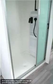  ??  ?? A tri-panel sliding door and very low sill provide easy access to the shower