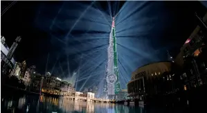  ?? File photo ?? The record-breaking laser show watched by millions in Burj Khalifa on New Year Eve. —