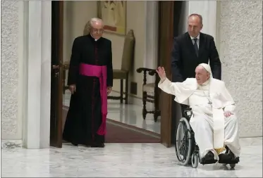  ?? GREGORIO BORGIA — THE ASSOCIATED PRESS ?? Pope Francis arrives May 14in a wheel chair to attend an audience with pilgrims from central Italy at the Vatican.