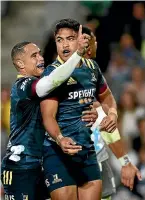  ?? GETTY IMAGES ?? Aaron Smith and Josh Ioane celebrate after Ioane’s try against the Chiefs in Dunedin on Saturday.