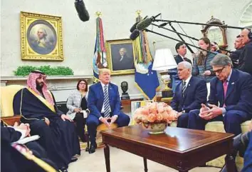  ?? Bloomberg ?? Saudi Arabia’s Crown Prince Mohammad Bin Salman with US President Donald Trump and Vice President Mike Pence during a meeting in the Oval Office in Washington on Tuesday.