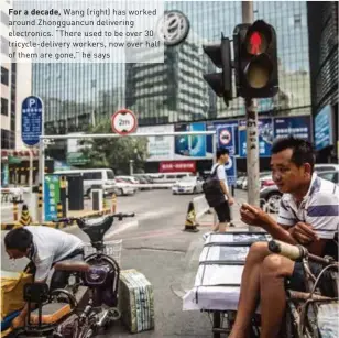  ??  ?? For a decade, Wang (right) has worked around Zhongguanc­un delivering electronic­s. “There used to be over 30 tricycle-delivery workers, now over half of them are gone,” he says