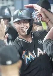  ?? John Amis Associated Press ?? GIANCARLO STANTON feels the legitimate home run season record is Roger Maris’ 61 in 1961.