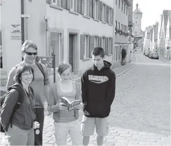  ??  ?? Small towns like Rothenburg, Germany, are perfect spots for teens to take a turn at leading the way.