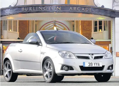  ??  ?? The Vauxhall Tigra is a little sports car which is as pretty as a picture, roof up or down