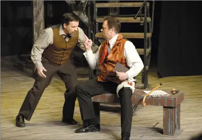  ?? NEWS PHOTO EMMA BENNETT ?? John Wilkes Booth, played by Doug Frelick (right), is warned by a friend, played by Paul Parks, that there is a manhunt out for him after his assassinat­ion of President Abraham Lincoln during the Medicine Hat Musical Theatre production of Assassins....