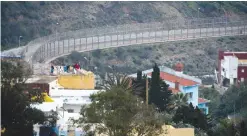  ??  ?? This photo taken on Feb 17, 2017 shows a general view of the fence between the Moroccan city of Fnideq and the Spanish enclave of Ceuta.