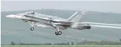  ?? MIRCEA ROSCA / AFP / GETTY IMAGES FILES ?? Two Royal Canadian Air Force CF-18s on a training exercise in Florida were wheels down when they were told they were landing at an abandoned airfield.