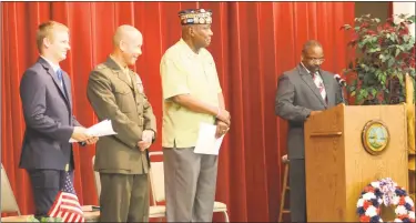  ??  ?? Indian Head Mayor Brandon Paulin, left, guest speaker Col. Michael A. Carter, Senior Master Sgt. Louis Knight and Staff Sgt. Jerome A Stoudamire stand at the introducti­on of the Memorial Day Ceremony in Indian Head on Tuesday.