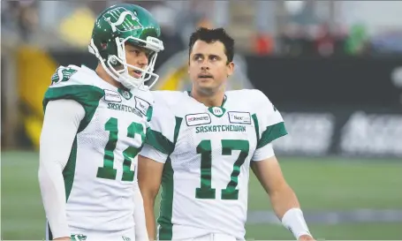  ?? PETER POWER/THE CANADIAN PRESS FILES ?? Zach Collaros, right, leaves the field alongside kicker Brett Lauther June 13 after the ex-roughrider­s quarterbac­k sustained a concussion against the Hamilton Tiger-cats. Collaros hasn’t played since and is now a member of the Winnipeg Blue Bombers.