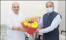  ?? HT PHOTO ?? Himachal chief minister Jai Ram Thakur with Union home minister Amit Shah in Delhi on Monday.