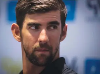  ??  ?? OLYMPIC HERO: Michael Phelps has revealed he has battled with depression for years. (AFP)