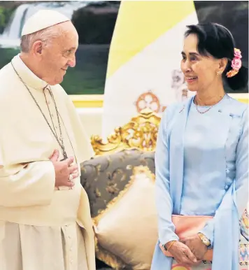  ??  ?? Pope Francis meets Aung San Suu Kyi in Naypyidaw, but failed to publicly mention the perceived persecutio­n of Rohingya Muslims