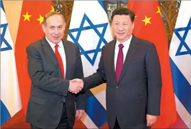  ?? FENG YONGBIN / CHINA DAILY ?? President Xi Jinping meets with Israeli Prime Minister Benjamin Netanyahu in Beijing on Tuesday.