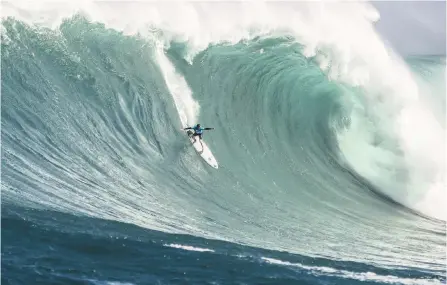  ??  ?? CURRENT world number one, Durbanite Grant ‘Twiggy’ Baker, drops into a monster of a wave at Pe’ahi in Maui, Hawaii placing fifth overall in the Jaws Challenge earlier this week. The event was dominated by Hawaiian surfers with Baker the only internatio­nal featuring in the six-man final. The event was won by Billy Kemper, followed by Kai Lenny, Albee Layer, Tyler Larronde, Baker and Koa Rothman. I WSL / Hallman