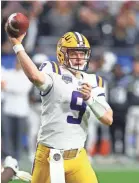  ?? ROSS D. FRANKLIN/AP ?? In his last three games, LSU quarterbac­k Joe Burrow completed 66 of 100 passes for 971 yards and nine touchdowns with one intercepti­on.