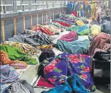  ?? SUBHANKAR CHAKRABORT­Y/HT PHOTOS ?? (Top and above) Passengers combating the cold at the Charbagh railway station in the wee hours of Sunday. Sunshine in the afternoon brought a little relief from the cold wave that has gripped the entire state.