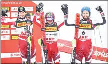  ??  ?? Austria’s Marcel Hirscher (center), winner of the men’s slalom, celebrates at the finish area with second-placed compatriot Michael Matt (left), and third-placed compatriot Marco Schwarz, at the alpine ski World Championsh­ips in Are, Sweden on Feb 17. (AP)