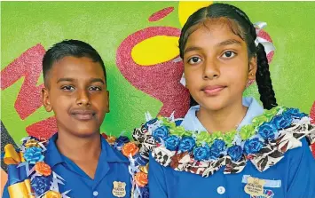  ?? Photo: Nolishma Narayan ?? Nakaikogo Sanatan Dharam Primary School head boy, Ryan Singh and head girl, Aditi Singh following their prefects induction in Koronivia, Nausori on May 20, 2022.