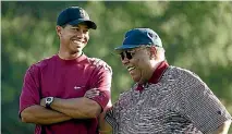  ?? PHOTO: GETTY IMAGES ?? Earl Woods, pictured with Tiger in 2004, comes in for the harshest characteri­sation in the biography.