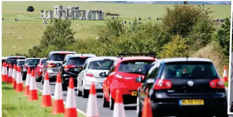  ??  ?? Cone henge: A monumental tailback on the A303 near Stonehenge in Wiltshire yesterday