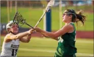  ?? NATE HECKENBERG­ER — FOR DIGITAL FIRST MEDIA ?? Methacton’s Sydney Tornetta fires out an outlet pass with West Chester Rustin’s Shannon Drakely putting on the pressure.