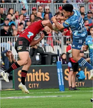  ?? GETTY ?? Crusaders star Will Jordan, above left, battles with Blues fullback Stephen Perofeta in April. At right, Moana Pasifika are out to make an impact in their debut season, while James O’Connor leads the Queensland Reds.