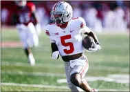  ?? NOAH K. MURRAY — THE ASSOCIATED PRESS ?? Ohio State wide receiver Garrett Wilson (5) runs after the catch for a touchdown against Rutgers, Oct. 2, in Piscataway, N.J.