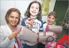  ?? Picture: Andy Jones FM4597294 ?? Mezi, Lily and Abigel who ran a stall selling hairband holders