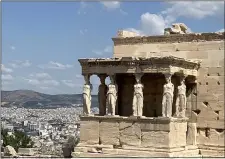  ?? COURTESY OF CATHRYN KNEZEVICH ?? The Erechtheio­n, opposite the Parthenon on the 7-acre Acropolis hilltop, is distinguis­hed by the Porch of the Caryatids, where six tall maidens serve as columns to support the roof.