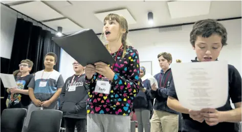  ?? JULIE JOCSAK/ POSTMEDIA NEWS ?? The Tomorrow's Voices choir rehearses at the Marilyn I. Walker School of Fine and Performing Arts.