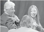  ?? Damon Winter / New York Times ?? Bill Clinton joins his daughter, Chelsea, before the debate held at the University of Nevada, Las Vegas.