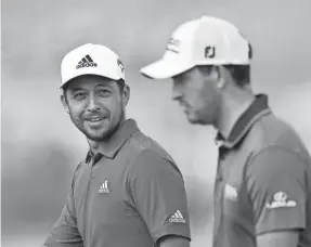  ?? CLIFF HAWKINS/GETTY IMAGES ?? Xander Schauffele, left, and Patrick Cantlay first teamed up in the Presidents Cup in Australia in 2019, going 2-2 in the team sessions.