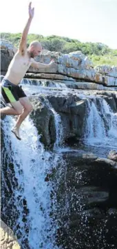  ??  ?? Marius du Plooy leaps in at Horseshoe Falls in the Mkambati Nature Reserve.