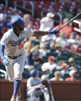  ??  ?? Los Angeles Dodgers’ Yasiel Puig (66) watches his third home run of the game a three-run homer against the St. Louis Cardinals in the eighth inning of a baseball game, on Saturday, at Busch Stadium in St. Louis. AP PHOTO/BILL BOYCE