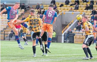  ??  ?? Charlie Fox, of Queen’s Park, powers in the equaliser against East Fife with a brilliant header