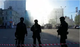  ?? ?? Police block a square after a drone fired on buildings in Kyiv, Ukraine, Monday, Oct. 17, 2022.