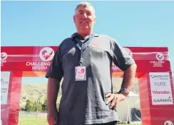  ?? PHOTO: TIM MILLER ?? In charge . . . Challenge Wanaka race director Bill Roxburgh in front of the finish line in Pembroke Park.