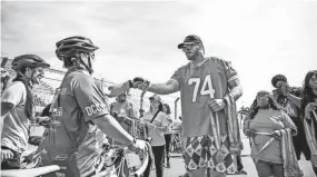  ?? TOMAS DINIZ SANTOS ?? Dolphins lineman Liam Eichenberg participat­es in the Dolphins Challenge Cancer.